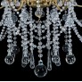 IQ4132 A CUT-GLASS AND GILT-BRONZE SIX-LIGHT CHANDELIER